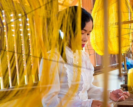 Golden Silk Weaving Process - Taken by Catherine Karnow